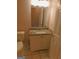 Bathroom features a granite countertop vanity, toilet, and tiled flooring at 7541 Coddington Ct, Riverdale, GA 30274