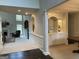 Bright living area features a fireplace, elegant columns, and built-in shelving for an open, inviting floor plan at 514 Augusta Dr, Canton, GA 30115