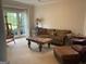 Cozy living room with large window, comfortable seating, and ample natural light creating a relaxing atmosphere at 514 Augusta Dr, Canton, GA 30115