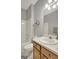Bright bathroom featuring a bathtub, shower, and vanity with sink, perfect for a refreshing start to the day at 203 Collierstown Way, Peachtree City, GA 30269