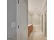 Bathroom with double vanity, wood cabinets, carpet, and large bathtub at 203 Collierstown Way, Peachtree City, GA 30269