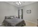 Serene bedroom with natural light, soft carpet, and a view of the greenery outside, offering a tranquil atmosphere at 203 Collierstown Way, Peachtree City, GA 30269