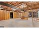 Unfinished basement with exposed beams, wooden framing, and concrete floors at 130 Gillson Dr, Mcdonough, GA 30253