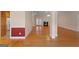 Spacious living area with hardwood floors and a cozy fireplace, perfect for gatherings at 130 Gillson Dr, Mcdonough, GA 30253
