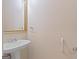 Half bath with pedestal sink and accessible grab bar at 130 Gillson Dr, Mcdonough, GA 30253