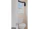 A simple half bath with a window at 130 Gillson Dr, Mcdonough, GA 30253