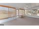 Bright sunroom with bamboo blinds and multiple windows offering ample natural light at 130 Gillson Dr, Mcdonough, GA 30253