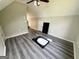Upstairs bedroom with gray floors and white walls at 238 Marks Rd, Mansfield, GA 30055
