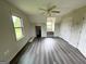 The bedroom features an interesting design with many windows and neutral paint at 238 Marks Rd, Mansfield, GA 30055