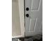 Close-up of a closed, white door with black hardware at 690 Mcdonough Se Blvd, Atlanta, GA 30315