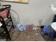 Interior shot of the flooring needing to be redone, with assorted items, suggesting renovation possibilities at 690 Mcdonough Se Blvd, Atlanta, GA 30315