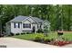 Charming single-story home with well-maintained landscaping and a welcoming front entrance at 5930 Shannon Dr, Cumming, GA 30040