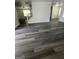 Open entryway displaying seamless flow and updated flooring and a staircase at 5041 Cottage Grove Pl, Union City, GA 30291