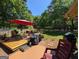 Backyard featuring outdoor seating and patio at 1710 Crumbley Rd, Mcdonough, GA 30252