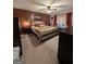 Cozy bedroom with warm tones, a decorative rug, and a comfortable bed setup at 1710 Crumbley Rd, Mcdonough, GA 30252
