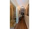 Hallway leads to a bathroom with a shower and other rooms, enhancing the house's flow at 1710 Crumbley Rd, Mcdonough, GA 30252