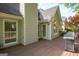 View of the back deck featuring home's exterior, with space for outdoor cooking and entertaining at 1270 Tribble Walk Ct, Lawrenceville, GA 30045