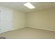 Bright basement with neutral carpet, door, and ample natural light at 1270 Tribble Walk Ct, Lawrenceville, GA 30045