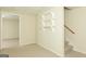 Spacious basement with stairs, shelving, and access to another room at 1270 Tribble Walk Ct, Lawrenceville, GA 30045