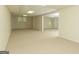 Expansive basement area with neutral carpeting and open layout at 1270 Tribble Walk Ct, Lawrenceville, GA 30045