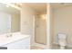Clean bathroom with tiled floors, enclosed shower, and modern vanity at 1270 Tribble Walk Ct, Lawrenceville, GA 30045