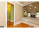 Open living area featuring fireplace, vaulted ceilings, and half bathroom at 1270 Tribble Walk Ct, Lawrenceville, GA 30045