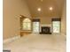 Spacious living room with fireplace and large windows providing natural light and a beautiful architectural design at 1270 Tribble Walk Ct, Lawrenceville, GA 30045
