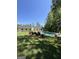 A peaceful backyard featuring a swimming pool and ample space for outdoor activities at 288 Trickum Creek Rd, Tyrone, GA 30290