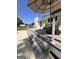 Backyard features a wooden deck with an umbrella table next to a swimming pool at 288 Trickum Creek Rd, Tyrone, GA 30290