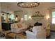 Cozy living area with stone fireplace and open concept floor plan at 288 Trickum Creek Rd, Tyrone, GA 30290