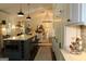 Open-concept living space with a large island that connects to kitchen at 288 Trickum Creek Rd, Tyrone, GA 30290