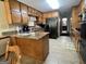 Spacious kitchen with granite countertops, an island, and stainless steel appliances perfect for modern living at 96 Daniel Ct, Mcdonough, GA 30253