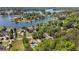 Stunning aerial view of lakefront homes with lush landscaping, swimming pools, and private docks at 3222 Bay View Dr, Jonesboro, GA 30236
