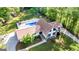 Aerial view of a home with a large backyard, a pool and patio area, and lush landscaping at 3222 Bay View Dr, Jonesboro, GA 30236