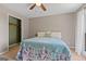 Bedroom with sailboat-themed bedding, a ceiling fan, and a window at 3222 Bay View Dr, Jonesboro, GA 30236