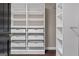 Custom walk-in closet with built-in shelving and drawers for optimal organization at 3222 Bay View Dr, Jonesboro, GA 30236