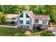 Charming home featuring stone accents, a gable roof, and well-maintained landscaping at 3222 Bay View Dr, Jonesboro, GA 30236