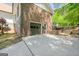 Spacious two-car garage with brick facade and concrete driveway at 3222 Bay View Dr, Jonesboro, GA 30236