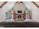 Bright living room with vaulted ceilings, statement fireplace, and backyard views at 3222 Bay View Dr, Jonesboro, GA 30236