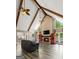 Cozy living room with brick fireplace, vaulted ceilings, and backyard views at 3222 Bay View Dr, Jonesboro, GA 30236