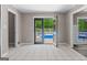 Patio room offering access to the pool area through open glass doors at 3222 Bay View Dr, Jonesboro, GA 30236