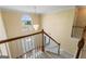 Bright foyer features a chandelier, large window and beautiful staircase at 643 Rangeley Meadows Ct, Hampton, GA 30228