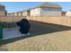 Large backyard with a new wooden fence offers plenty of space and privacy at 169 Cabin Way, Hampton, GA 30228