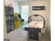 Fun game room with an air hockey table, retro arcade game and mini bar at 169 Cabin Way, Hampton, GA 30228