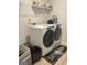Well-equipped laundry room featuring modern appliances and ample space at 169 Cabin Way, Hampton, GA 30228
