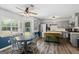 Eat-in kitchen area featuring modern appliances, a butcher block island, and backyard access at 90 Harlin Ct, Covington, GA 30014