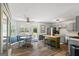 This kitchen area features an island and a dining area with backyard access at 90 Harlin Ct, Covington, GA 30014