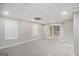Finished basement space with recessed lighting, neutral carpet, and natural light at 1085 Crown River Pkwy, Mcdonough, GA 30252