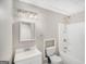 Small bathroom with a vanity, toilet, and shower-tub combo with basic fixtures at 1085 Crown River Pkwy, Mcdonough, GA 30252