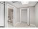 Compact bathroom features a shower-tub combo, toilet, and storage space at 1085 Crown River Pkwy, Mcdonough, GA 30252